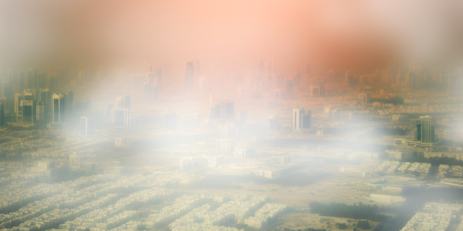 Hazy atmosphere around a highly urbanized city representing increased greenhouse gas emissions